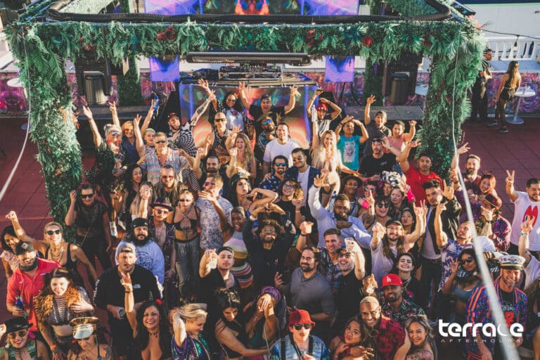 Crowd posing for group photo at Terrace Afterhours