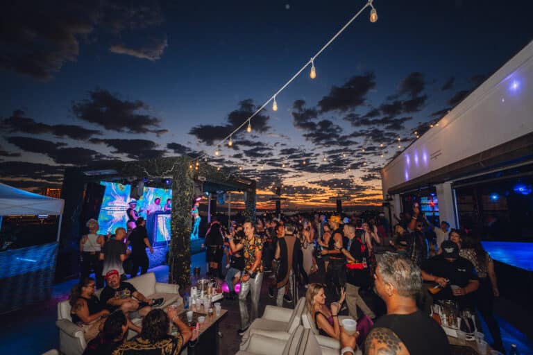 Party goers enjoying the sunrise DJ set at Terrace Afterhours club