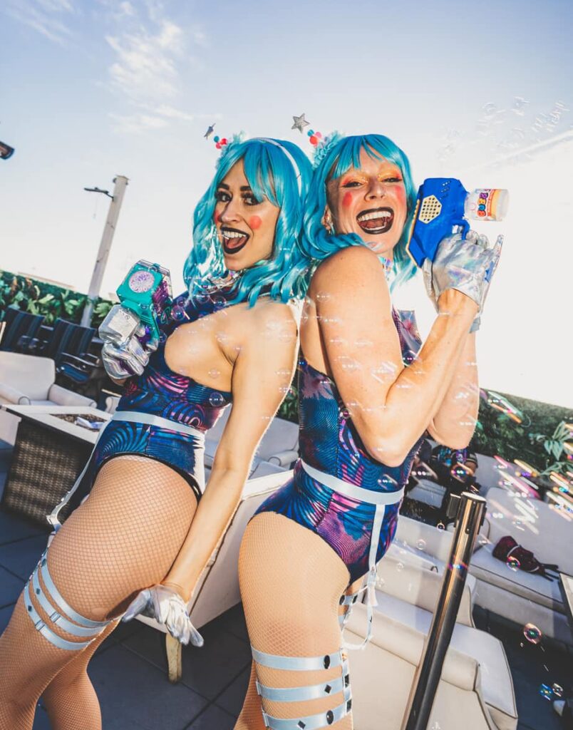 Group of gogo dancers posed for a picture at rooftop party in Las Vegas