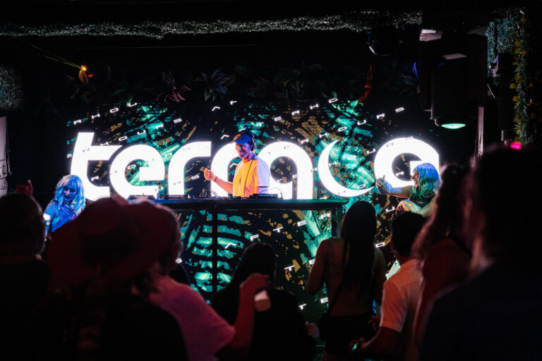 crowd dancing at Terrace Afterhours nightclub in Las Vegas with DJ and LED visuals