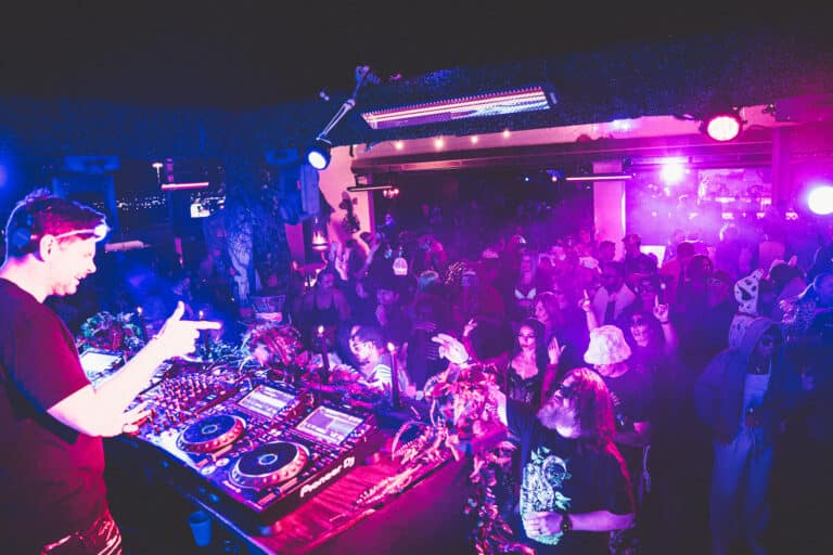 Crowd dancing to underground house music set at Terrace Afterhours club in Las Vegas