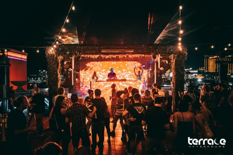 people dancing in front of the Terrace Afterhours nightclub stage
