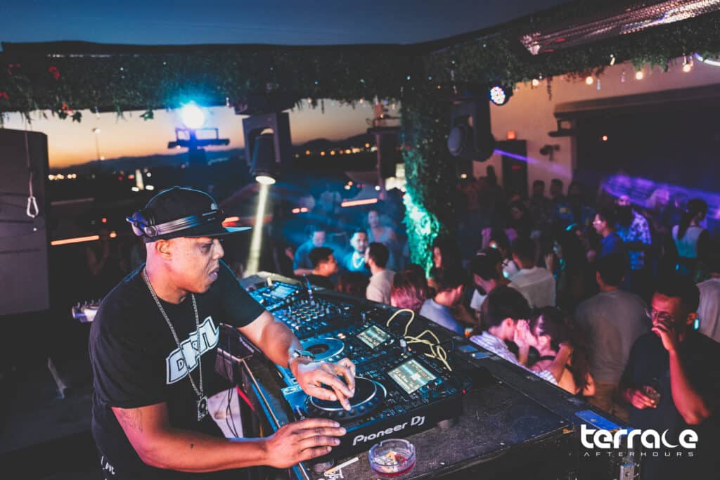 House music DJ peforming at Terrace Afterhours at dawn