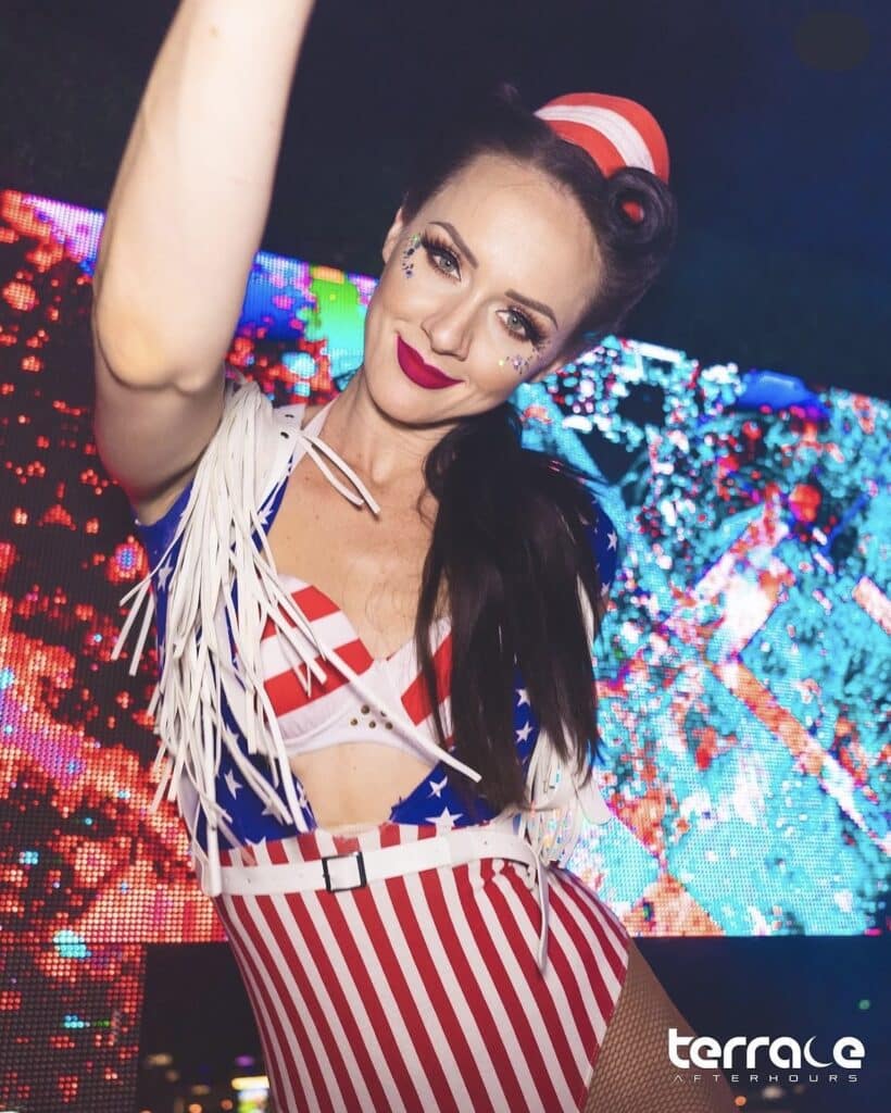 gogo dancer at terrace afterhours dressed in red, white, and blue clothing for 4th of july event